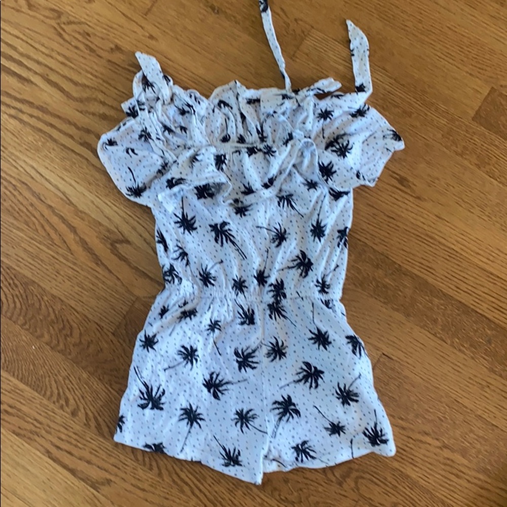 Billabong romper size s with shoulder bow straps